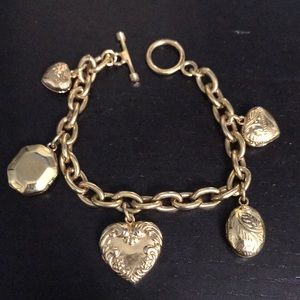 Stunning gold heart & more locket toggle bracelet